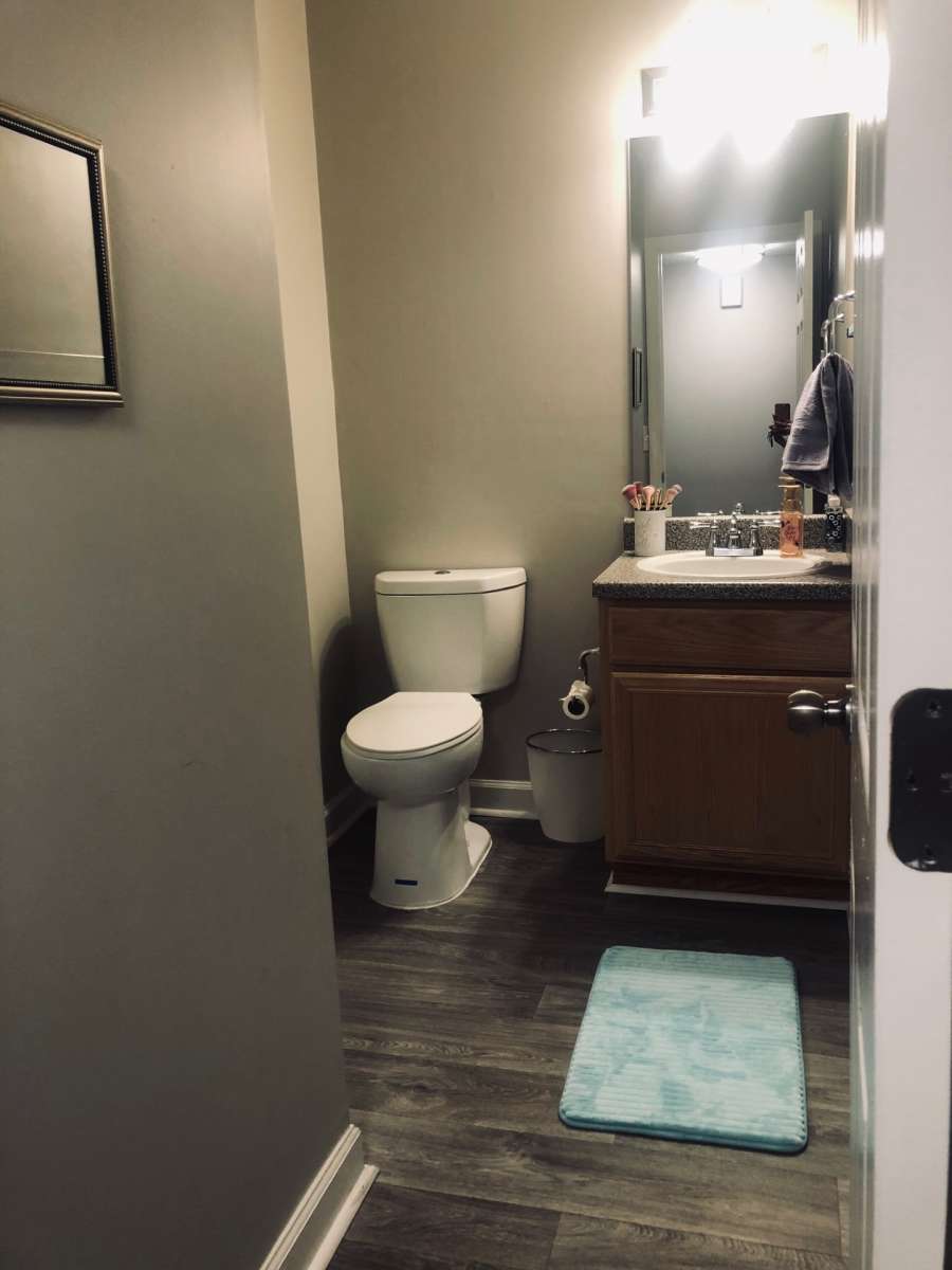 a bathroom with a toilet and sink