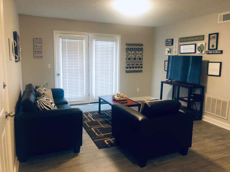 a living room with a couch and a television