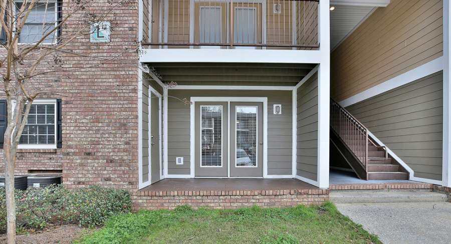 a building with a door and stairs